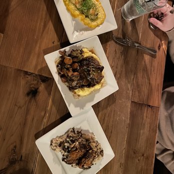 Rustic Roots - Shrimp and grits, beef short rib and polenta, and mushroom risotto. - Gastropubs Near Me - Burlington, Wisconsin Rustic Roots - Shrimp and grits, beef short rib and polenta, and mushroom risotto. - Gastropubs Near Me - Burlington, Wisconsin