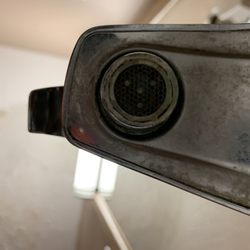 Econo Lodge - Filth on sink faucet