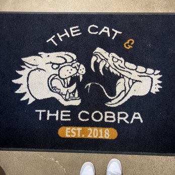 The Cat and the Cobra - Mat at door - Used, Vintage & Consignment Near Me - Minneapolis, Minnesota The Cat and the Cobra - Mat at door - Used, Vintage & Consignment Near Me - Minneapolis, Minnesota