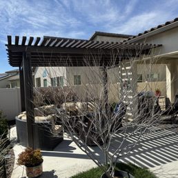 Lattice patio cover in Spanish brown from side view.