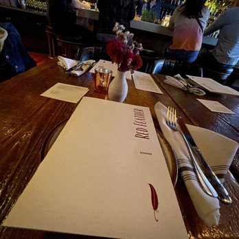 Red Feather Lounge - a restaurant table with menus and silverware - Lounges Near Me - Boise, Idaho Red Feather Lounge - a restaurant table with menus and silverware - Lounges Near Me - Boise, Idaho