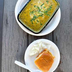 EggLaari - Egg cheese masala ($13.99) with the pav and raw onions that come on the side