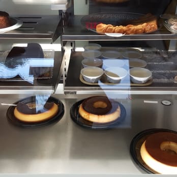 Sol Cubano - The dessert/bakery case with flan, coconut pudding and other pastries. - Cuban Near Me - North Highlands, California Sol Cubano - The dessert/bakery case with flan, coconut pudding and other pastries. - Cuban Near Me - North Highlands, California