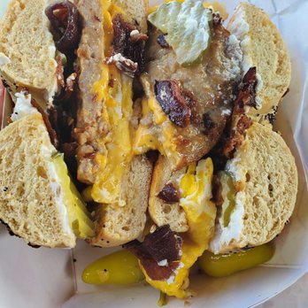 Cafe Donuts - Sausage, bacon, egg and cheese sandwich on an everything bagel with my weird addition of pickles and cream cheese. Also a side of chilis! - Coffee & Tea Near Me - West Covina, California Cafe Donuts - Sausage, bacon, egg and cheese sandwich on an everything bagel with my weird addition of pickles and cream cheese. Also a side of chilis! - Coffee & Tea Near Me - West Covina, California