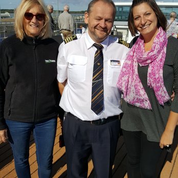 ChiProTravel.com - Joanne Mueller, Travel Agent/Franchise Owner - With Captain Andreas aboard the AmaDante on the Danube River. - Travel Agents Near Me ChiProTravel.com - Joanne Mueller, Travel Agent/Franchise Owner - With Captain Andreas aboard the AmaDante on the Danube River. - Travel Agents Near Me