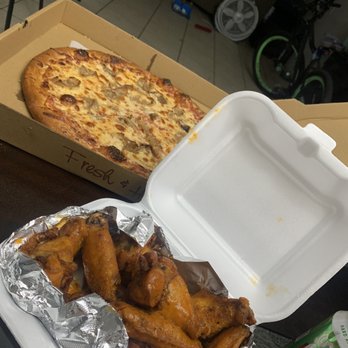 Broadway Pizza & Subs - a box of pizza and a box of fries - Chicken Wings Near Me - West Palm Beach, Florida