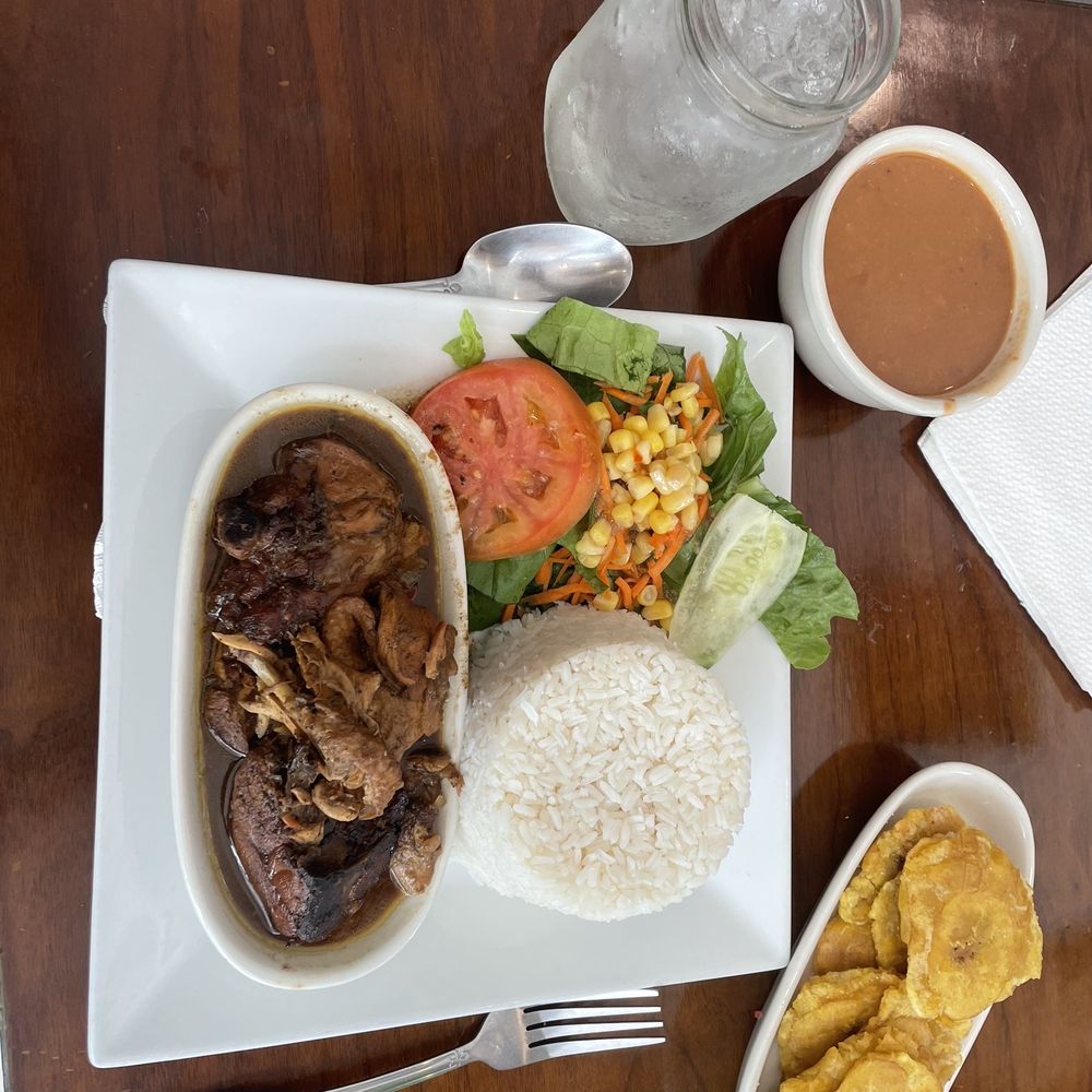 Wanda Mofongo House - Chicken Stewed with rice & beans Side order of Tostones - Spanish Near Me - Scranton, Pennsylvania Wanda Mofongo House - Chicken Stewed with rice & beans Side order of Tostones - Spanish Near Me - Scranton, Pennsylvania