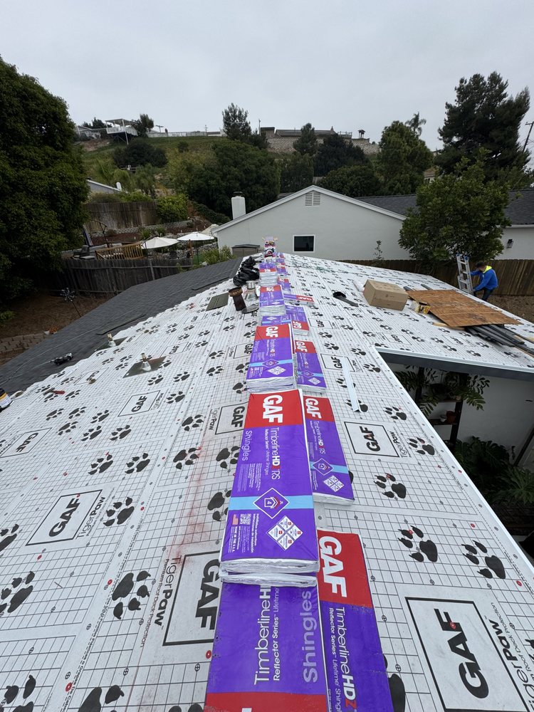 Slide of Mister Roofing