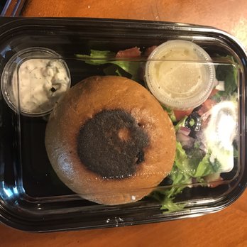 Pita Jungle - Salmon burger with a burnt bun - Mediterranean Near Me - Phoenix, Arizona Pita Jungle - Salmon burger with a burnt bun - Mediterranean Near Me - Phoenix, Arizona