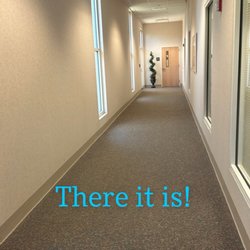 The Spa At Mcleod - A long distance image of the main entrance to the Spa at Mcleod Health & Fitness center