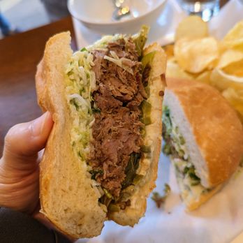 Southie - Spicy Hog sandwich. $16. Pulled pork, Southie slaw, pickled jalapeno, lime aioli, Acme bun. - Sandwiches Near Me - Oakland, California Southie - Spicy Hog sandwich. $16. Pulled pork, Southie slaw, pickled jalapeno, lime aioli, Acme bun. - Sandwiches Near Me - Oakland, California
