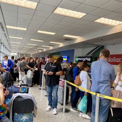 Buffalo Niagara International Airport - 06.08.23 car rental place across the street from the baggage claim area... long lines and overcrowded