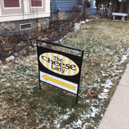 Sign next to the front entrance pointing to the front entrance! Sign next to the front entrance pointing to the front entrance!