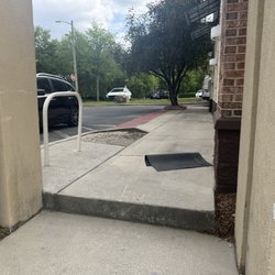 Emergency Physicians Medical Center - Black car is handicap parking leading to the step.