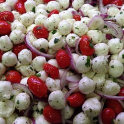 Homemade mozzarella, tomatoes & onion  salad