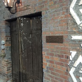 Standby - Enter through giant heavy wood doors in The Belt alley. - New American Near Me - Detroit, Michigan Standby - Enter through giant heavy wood doors in The Belt alley. - New American Near Me - Detroit, Michigan