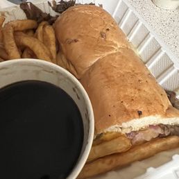 French dip with fries & aus juice. You HAVE to try it once at least!!!!  Great job Carolyn's Cafe.