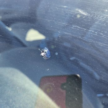 Glass Guys - Before photo of chipped glass - Auto Glass Services Near Me