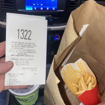 McDonald's - Half full large fry just purchased. Check receipt time and clock. No effort to give a full order, just here you go f#ck you bye. - Burgers Near Me - Four Oaks, North Carolina
