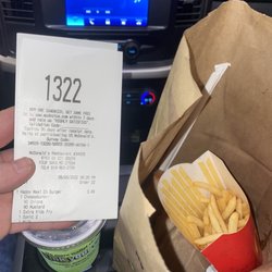 McDonald's - Half full large fry just purchased. Check receipt time and clock. No effort to give a full order, just here you go f#ck you bye.