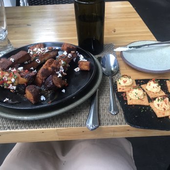 Husk - Pork ribs and pimiento cheese crackers with ham crackins - American Near Me - Charleston, South Carolina Husk - Pork ribs and pimiento cheese crackers with ham crackins - American Near Me - Charleston, South Carolina