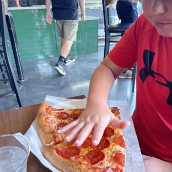 Lil Capo Pizzeria - Look mom. It's bigger than my hand! - Pizza Near Me - Glendale, Arizona Lil Capo Pizzeria - Look mom. It's bigger than my hand! - Pizza Near Me - Glendale, Arizona