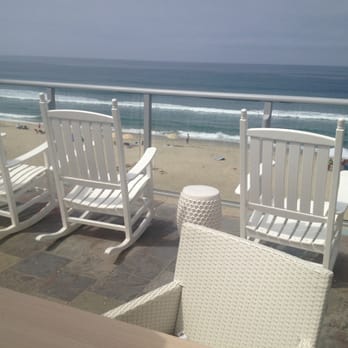 Beach Terrace - Rocking to the waves on the terrace. - Hotels Near Me - Carlsbad, California Beach Terrace - Rocking to the waves on the terrace. - Hotels Near Me - Carlsbad, California