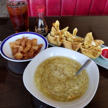 Green Basil - Egg drop soup (I added some soy sauce).. home made--fried noodles and crab Rangoon...yes, their Sweet Green Tea is fire - Asian Fusion Near Me - Lilburn, Georgia