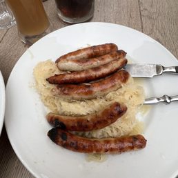 Regensburg Sausage over sauerkraut. Delicious!! Best sausages in German! Regensburg Sausage over sauerkraut. Delicious!! Best sausages in German!