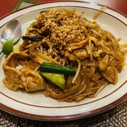 a plate of noodles with meat and vegetables a plate of noodles with meat and vegetables