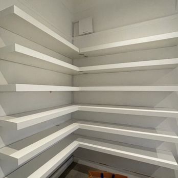 Call Handyman Services - installing shelves in a room - Handyman Near Me