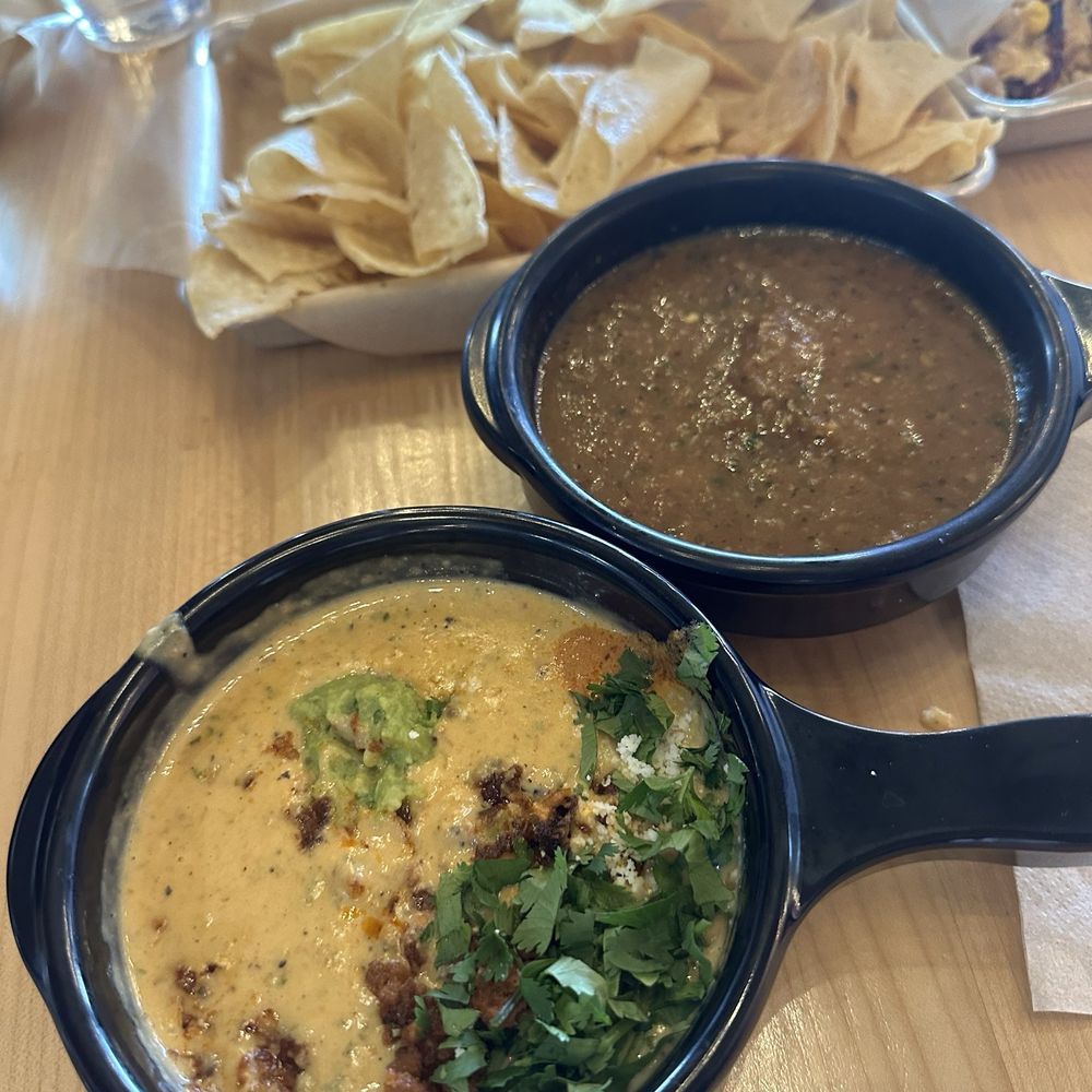 Torchy's Tacos - Queso with Chorizo, Salsa & Chips - Tex-Mex Near Me - Denver, Colorado Torchy's Tacos - Queso with Chorizo, Salsa & Chips - Tex-Mex Near Me - Denver, Colorado