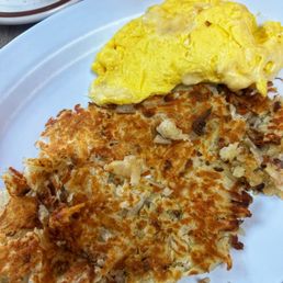 Scrambled eggs, Swiss cheese, hashbrowns Scrambled eggs, Swiss cheese, hashbrowns