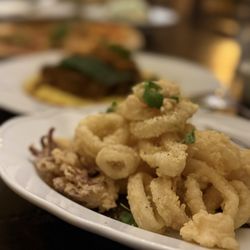 Il Postino - Calamari Fritti $29 lightly battered & fried calamari, served with fresh lemon & aioli