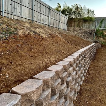 Active Landscape And Tree Service - New 60ft long wall we've had since Feb 2022 (footing, drainage not seen but there) they also removed the old wall. - Tree Services Near Me Active Landscape And Tree Service - New 60ft long wall we've had since Feb 2022 (footing, drainage not seen but there) they also removed the old wall. - Tree Services Near Me