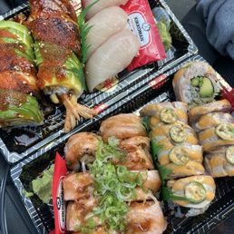 Dragon roll, hamachi nigiri, salmon lover and Hamachi Jalapeno Roll Dragon roll, hamachi nigiri, salmon lover and Hamachi Jalapeno Roll