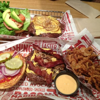 Smashburger - Build your own burger (top) and bacon cheeseburger with mushrooms and a side of fried onions. - Burgers Near Me - Tucson, Arizona Smashburger - Build your own burger (top) and bacon cheeseburger with mushrooms and a side of fried onions. - Burgers Near Me - Tucson, Arizona