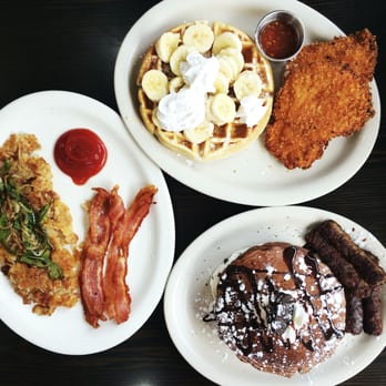Champ’s Diner - Oreo pancakes with side of sausage, hash browns and bacon, chicken and waffles with banana topping - Breakfast & Brunch Near Me - Philadelphia, Pennsylvania