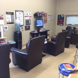 Boudreaux's Automotive Care - Coffee, water, tv, and comfy chairs all included