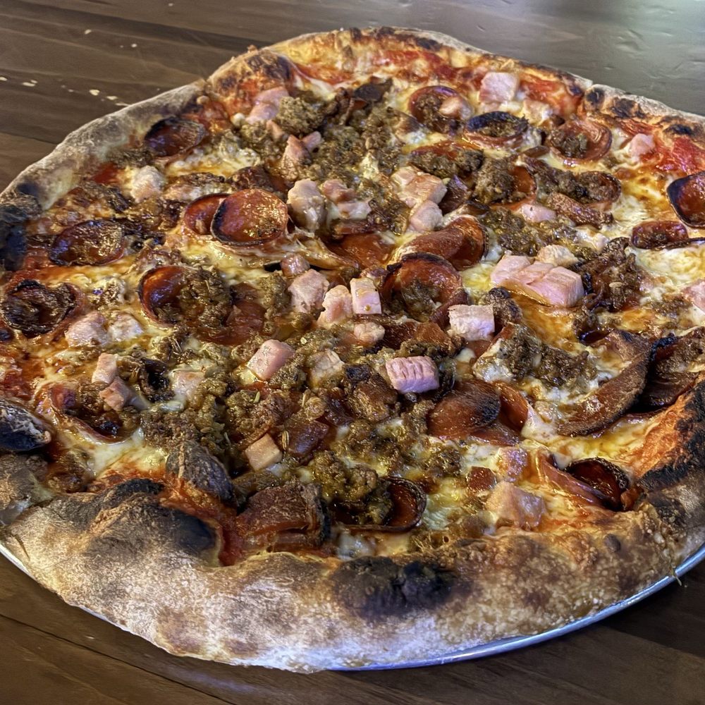 Over Under - The Village Dallas - Meat lovers pizza - Sports Bars Near Me - Dallas, Texas Over Under - The Village Dallas - Meat lovers pizza - Sports Bars Near Me - Dallas, Texas