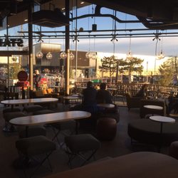 Starbucks - Loads of natural light. A vast improvement of their former place