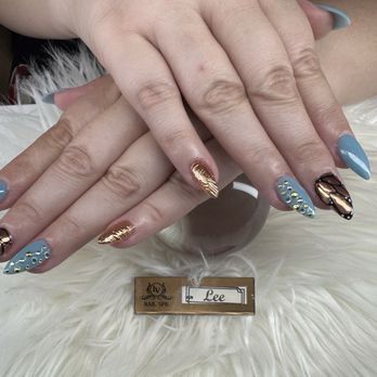 LV Nails & Spa - Nail design including hand painted monarch wings, gems and chrome 3-D - Nail Salons Near Me - Orange City, Florida LV Nails & Spa - Nail design including hand painted monarch wings, gems and chrome 3-D - Nail Salons Near Me - Orange City, Florida