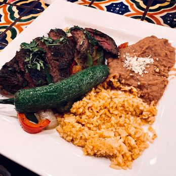 Mi Nueva Tierra - Steak Fajitas with Beans and Rice! - Mexican Near Me - Chicago, Illinois Mi Nueva Tierra - Steak Fajitas with Beans and Rice! - Mexican Near Me - Chicago, Illinois