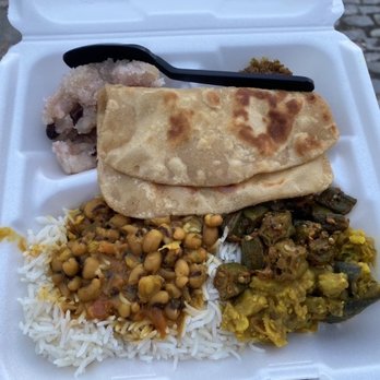 Govinda Restaurant - 02/11/22's Thali consisting of: Lentils, rice, roti, okra, potatoes, fried veggie patty, and a dessert (unsure of the names on the last two) - Vegan Near Me - Richmond, Virginia Govinda Restaurant - 02/11/22's Thali consisting of: Lentils, rice, roti, okra, potatoes, fried veggie patty, and a dessert (unsure of the names on the last two) - Vegan Near Me - Richmond, Virginia