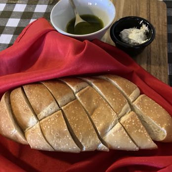 Vincenzo’s Cucina - warm Italian bread with pesto and garlic herb butter - Desserts Near Me - Prescott, Arizona Vincenzo’s Cucina - warm Italian bread with pesto and garlic herb butter - Desserts Near Me - Prescott, Arizona