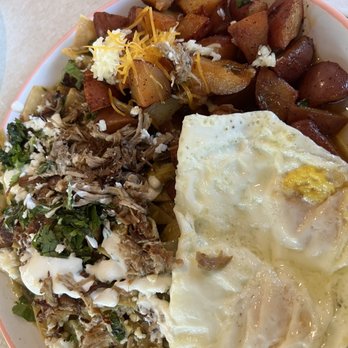 Vic's All Star Kitchen - Chilaquiles with carnitas, country potatoes. Over easy eggs. - American Near Me - Pleasanton, California