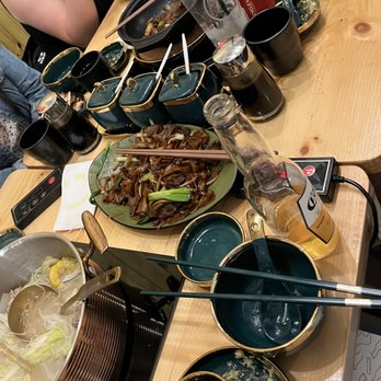 Royal Rooster - Ordered fried rice, noodles, a chicken dish, braised pork, and two signature coconut hot pot with chicken and vegetables - Chinese Near Me - Little Neck, New York