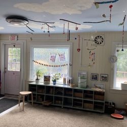 Building Blocks Preschool - Whimsical clouds on a classroom ceiling. Tons of natural light & large windows to enjoy views of nature from inside as well.
