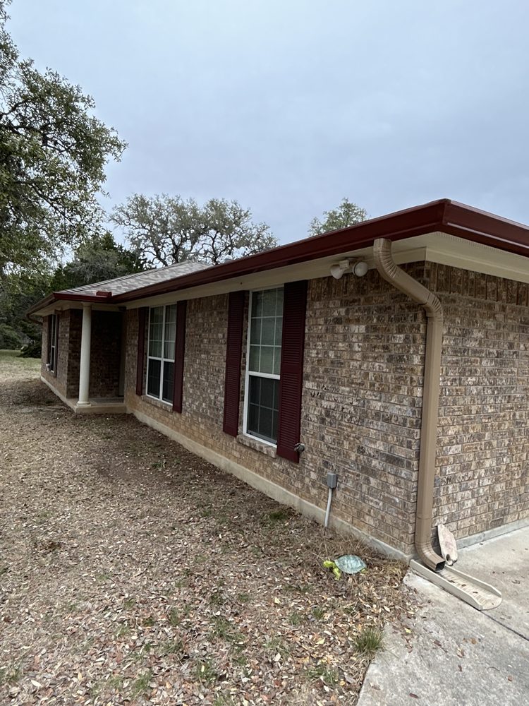 Slide of Gonzalez Seamless Rain Gutters