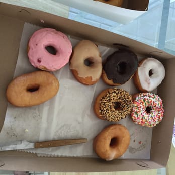 Flip Flops Donut Shop - Was unable to shoot the pic before some of the donuts mysteriously disappeared. - Donuts Near Me - Emerald Isle, North Carolina